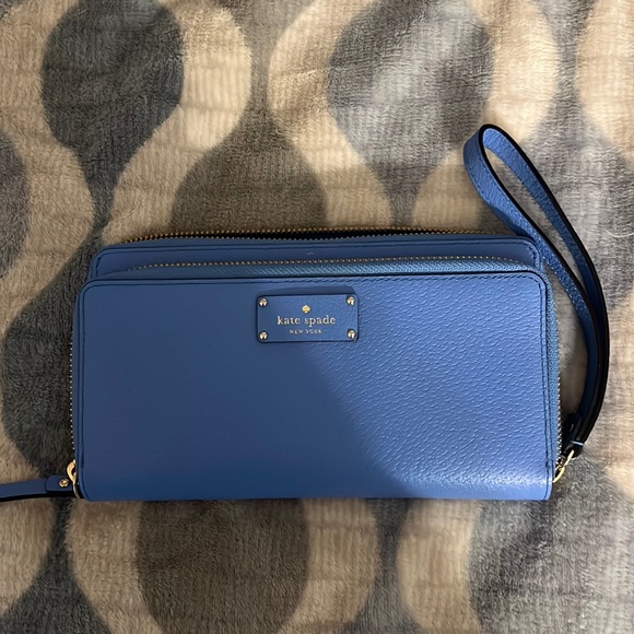 Really pretty Kate Spade wristlet. Double zipper, plenty of room. NWOT